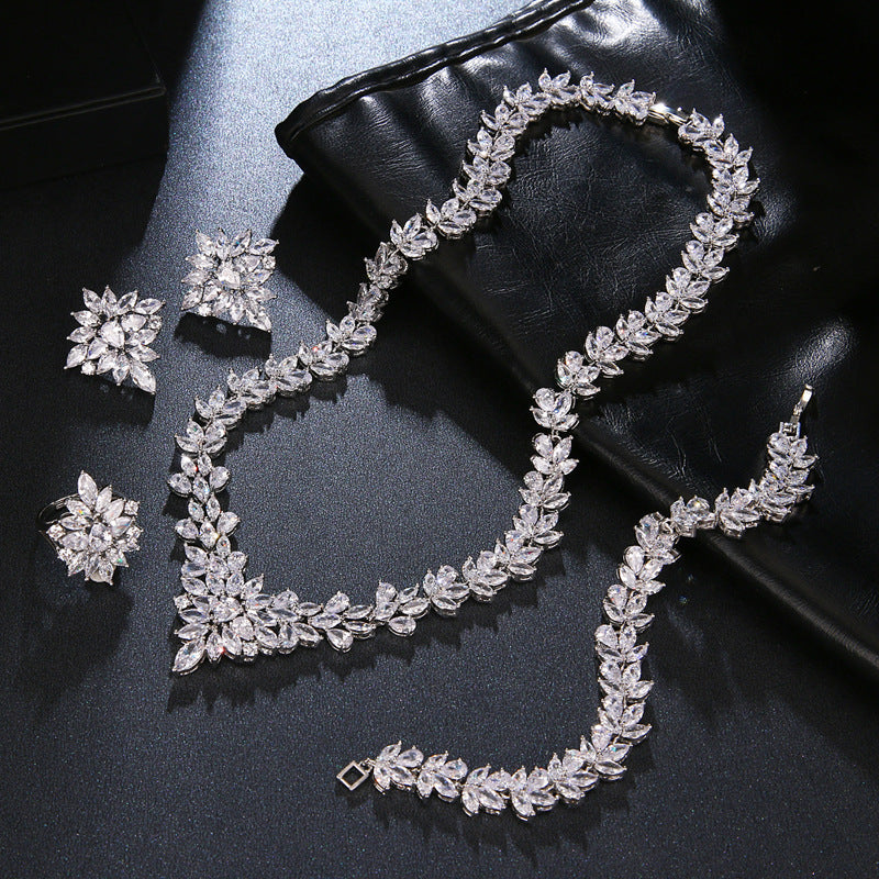 Handcrafted With Copper And Set With Zircon Stones.