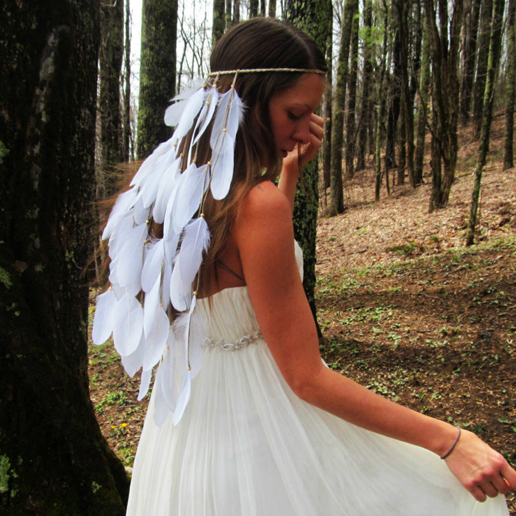 white featherhead Bohemia wedding bride's feather band