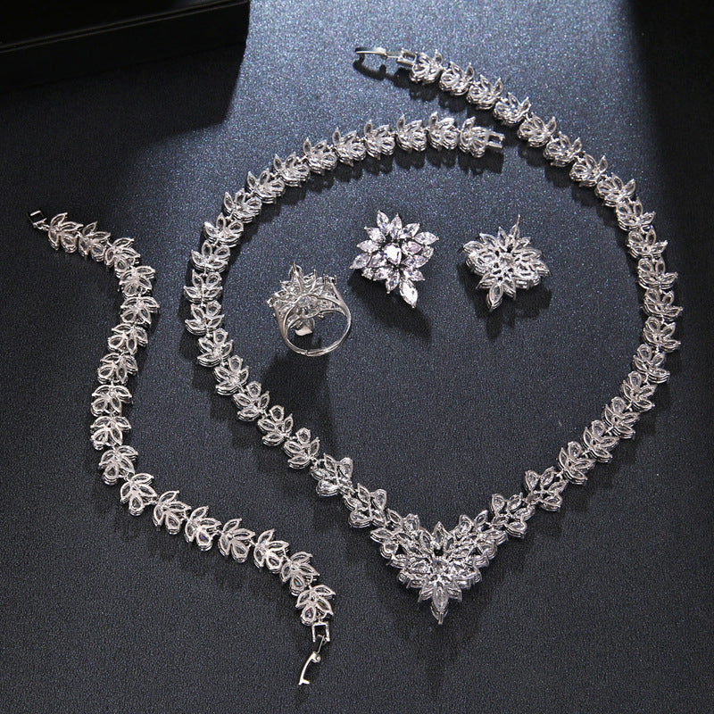 Handcrafted With Copper And Set With Zircon Stones.